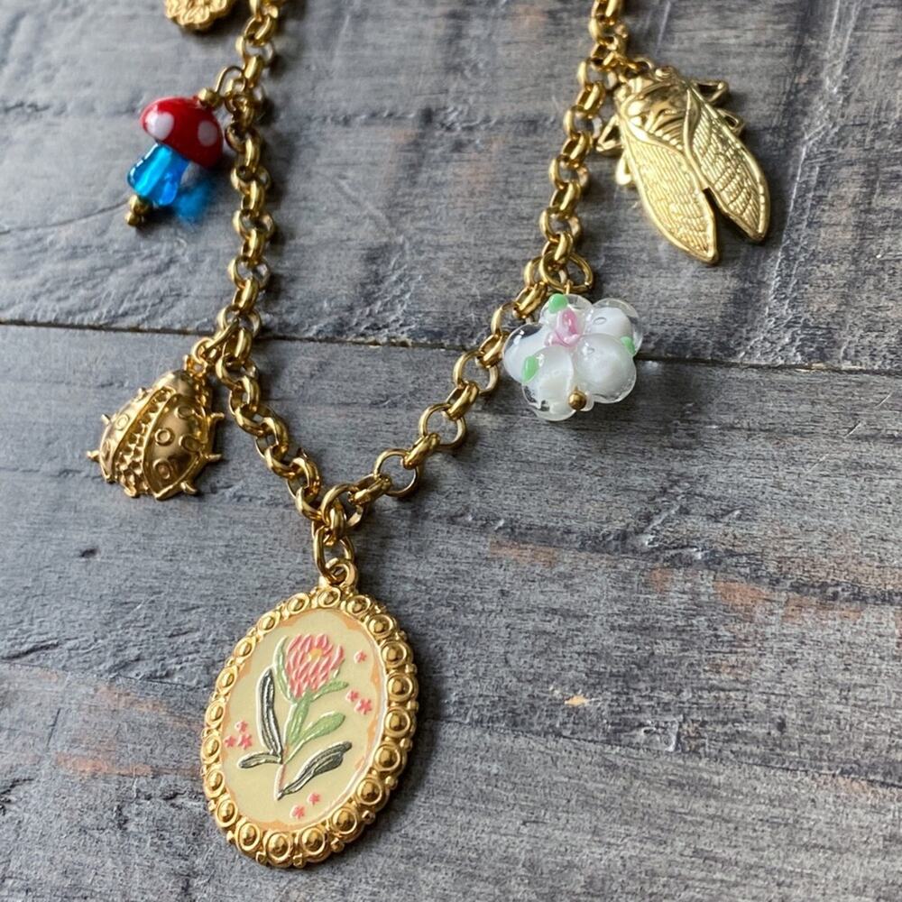 NEW Gold Insect Charm Necklace With Floral Pendant